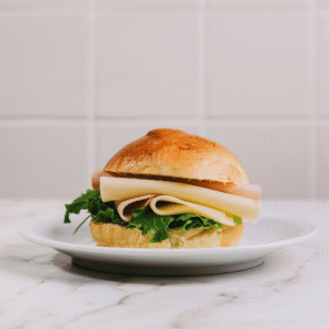 Brioche c/fiambre de peru e queijo